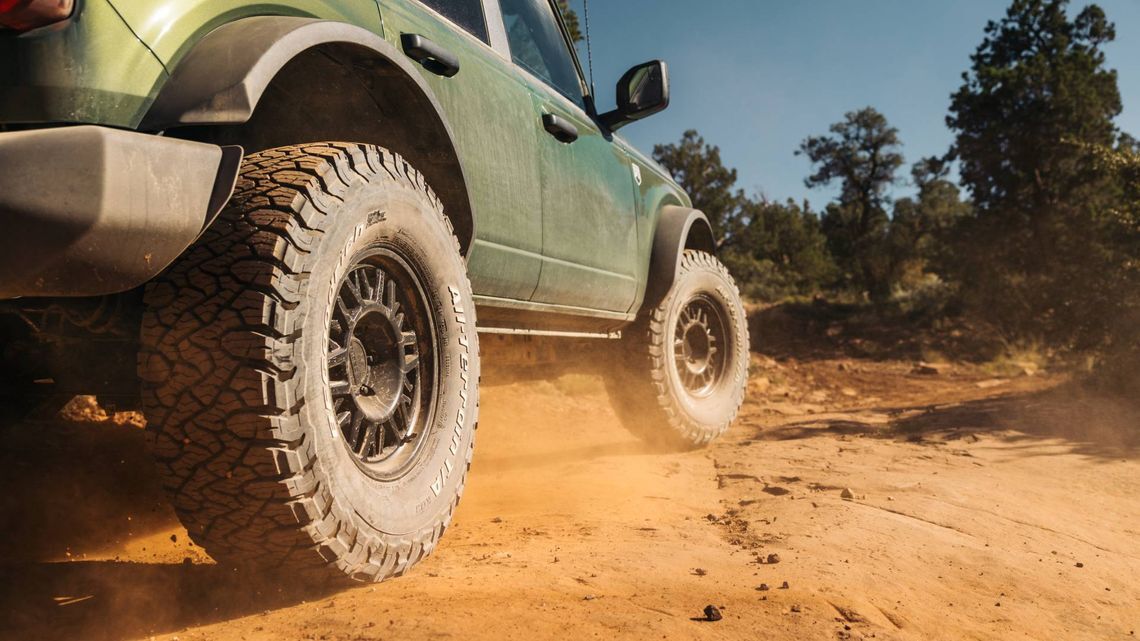 Extended shoulder rubber down the sidewall to protect more of the critical sidewall failure zone.